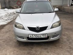 Фото авто Mazda Demio