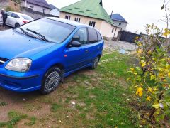 Photo of the vehicle Nissan Almera Tino