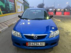 Photo of the vehicle Mazda 323