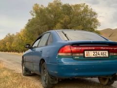 Photo of the vehicle Mazda Cronos