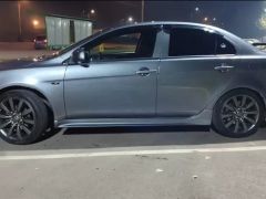 Фото авто Mitsubishi Lancer