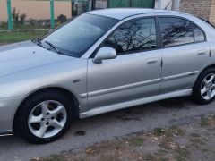 Сүрөт унаа Mitsubishi Carisma