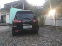 Photo of the vehicle Mazda Demio