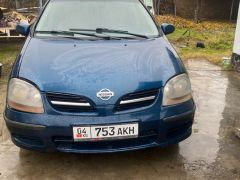 Photo of the vehicle Nissan Almera Tino