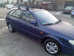 Фото авто Mazda 323