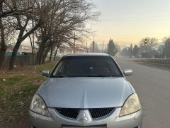 Фото авто Mitsubishi Lancer