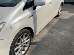 Фото авто Toyota Prius v (+)