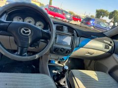 Сүрөт унаа Mazda 323