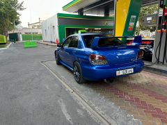 Photo of the vehicle Subaru Impreza WRX STi