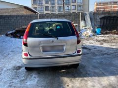 Сүрөт унаа Nissan Almera Tino