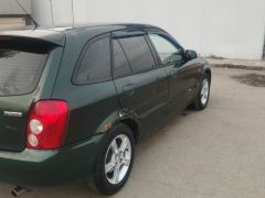 Photo of the vehicle Mazda 323