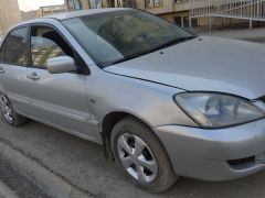 Фото авто Mitsubishi Lancer