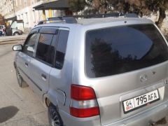 Сүрөт унаа Mazda Demio