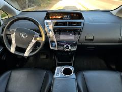 Фото авто Toyota Prius v (+)