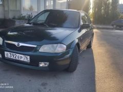 Фото авто Mazda 323