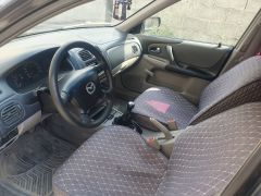 Photo of the vehicle Mazda 323