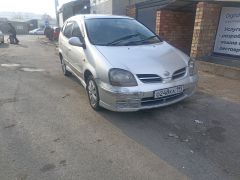 Photo of the vehicle Nissan Almera Tino