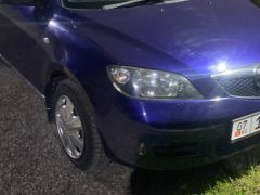 Photo of the vehicle Mazda Demio