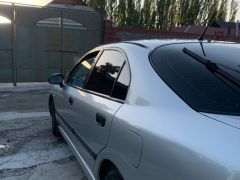 Сүрөт унаа Mitsubishi Carisma