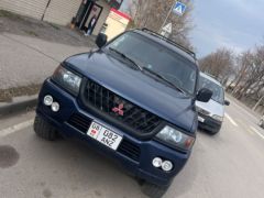 Сүрөт унаа Mitsubishi Montero Sport