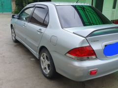 Фото авто Mitsubishi Lancer