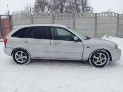 Фото авто Mazda 323