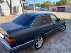 Сүрөт унаа Mercedes-Benz W124