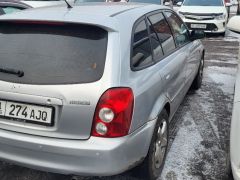 Сүрөт унаа Mazda 323