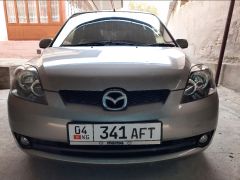 Фото авто Mazda Demio