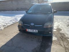 Фото авто Nissan Almera Tino