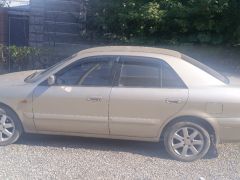 Photo of the vehicle Mazda 626