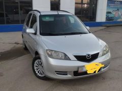 Photo of the vehicle Mazda Demio