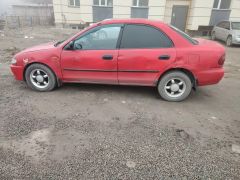 Photo of the vehicle Mazda 323