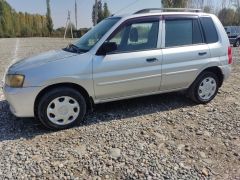 Photo of the vehicle Mazda Demio