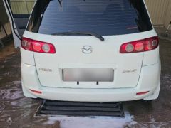 Photo of the vehicle Mazda Demio