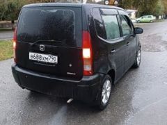 Фото авто Honda Capa