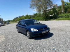 Фото авто Mitsubishi Lancer