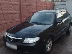 Фото авто Mazda 323