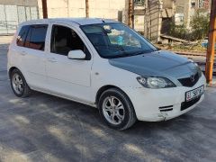 Сүрөт унаа Mazda Demio