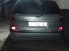 Photo of the vehicle Nissan Almera Tino