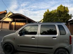 Photo of the vehicle Suzuki Wagon R+