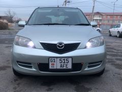 Photo of the vehicle Mazda Demio