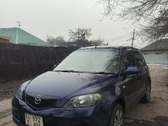 Photo of the vehicle Mazda Demio