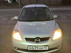 Фото авто Mazda Demio