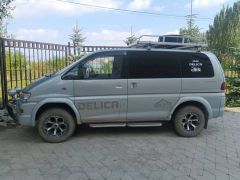 Сүрөт унаа Mitsubishi Delica