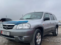 Photo of the vehicle Mazda Tribute