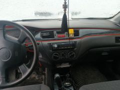 Photo of the vehicle Mitsubishi Lancer