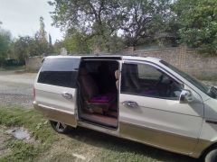 Сүрөт унаа Kia Carnival