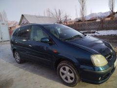 Фото авто Nissan Almera Tino