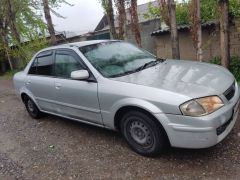 Фото авто Mazda Familia